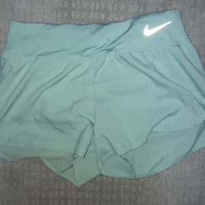 Turquoise Nike shorts